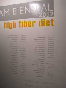 The big wall of artists participating in the show.