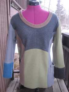If you look at the grey wool closely you will see a little pocket. I love doing this--taking cardigan pockets and incorporating them into the new sweater.