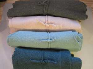 I then roll the cut sweater into a little bundle and tie it with one of its seams. ARen't these just beautiful to look at?