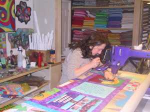 Here we are stitching away. In the present day, we are revamping my studio, so it feels funny to see old shelving.