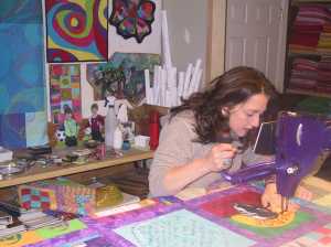 The great thing about being the quilter for a community quilt is that as you quilt each quilters block you really get to know each person in the quilt.