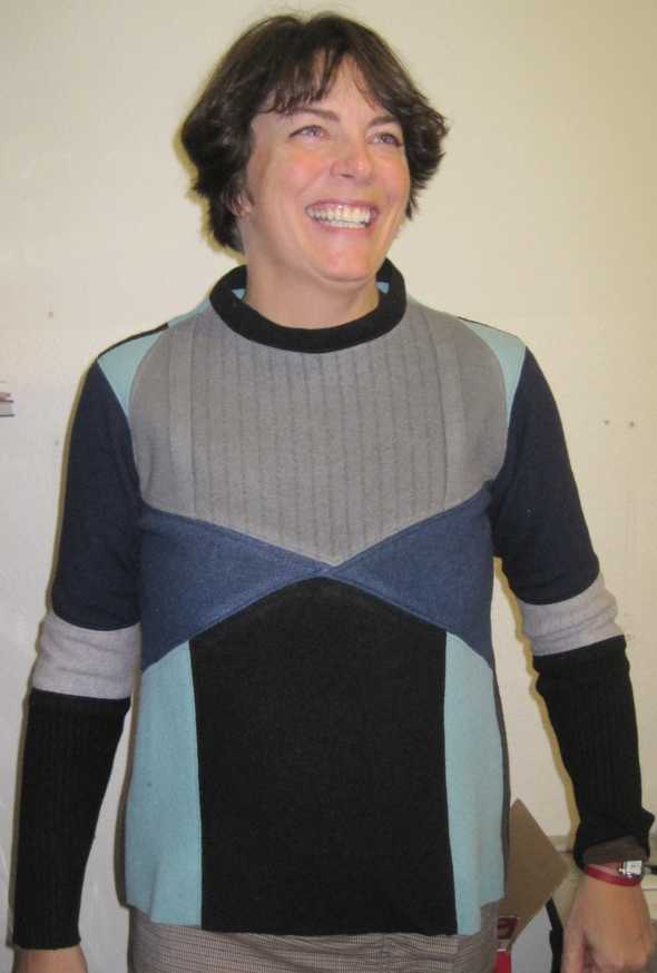 Here is Beth wearing one of my THE MOD sweaters. The colors look great on her which is part of why the Queen of the North will be wearing blue.