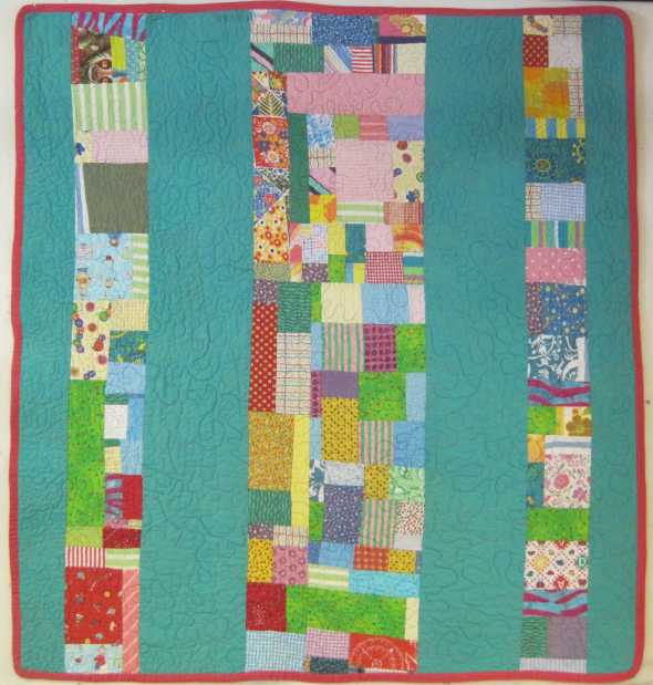 Here is the pieced back of Fletcher's quilt. I like it as much as the front.